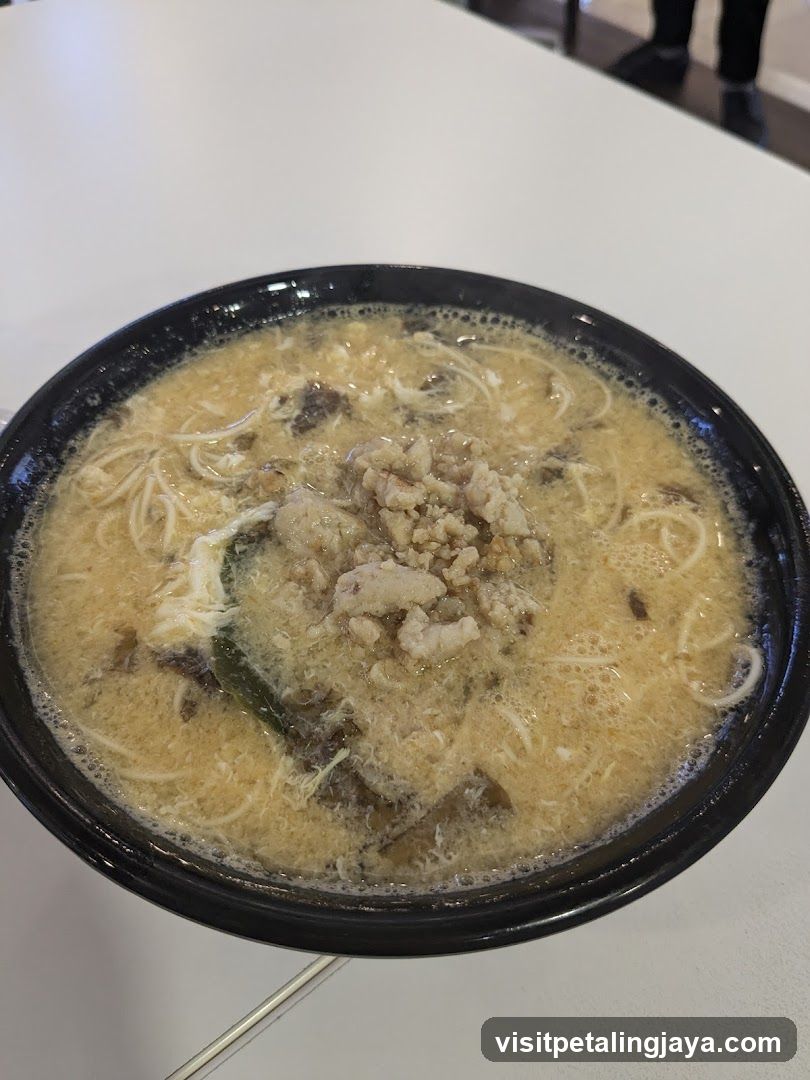 Bowl of Noodle Soup with Toppings