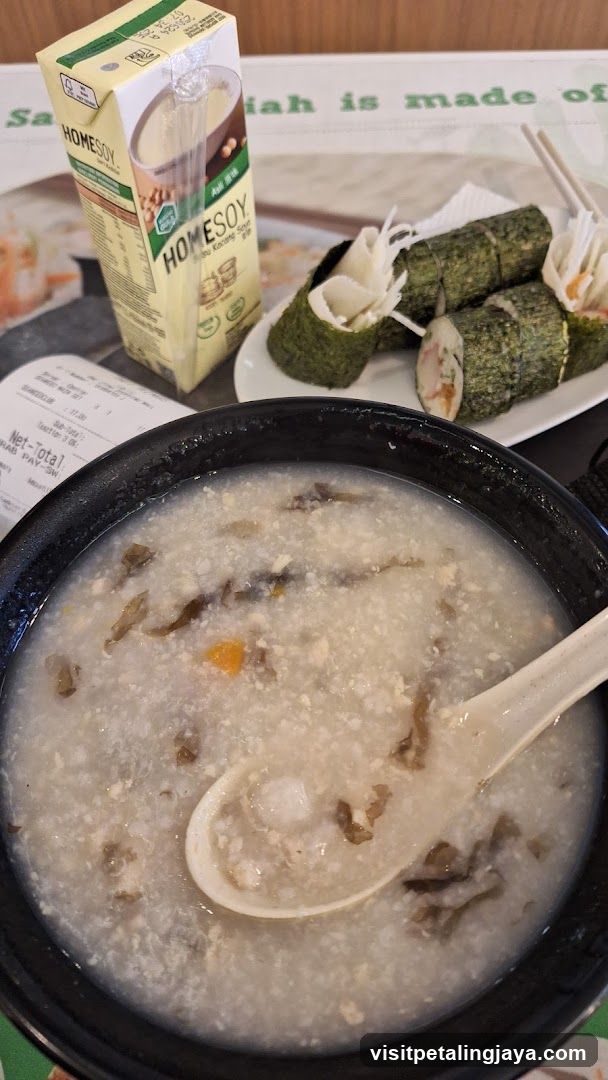 Breakfast Meal with Porridge and Rolls