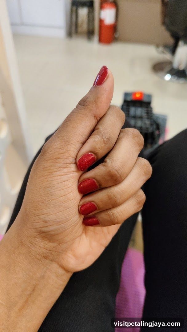 Hand with Red Nail Polish
