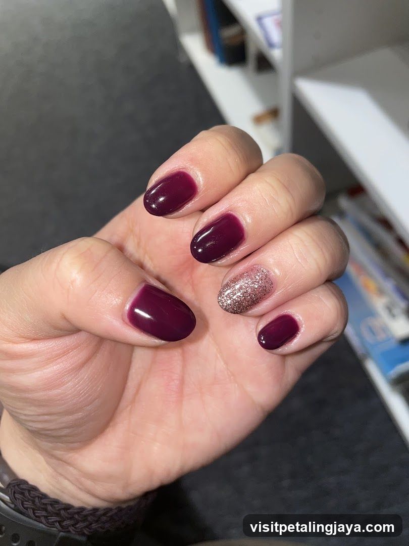 Maroon and Glitter Nail Art