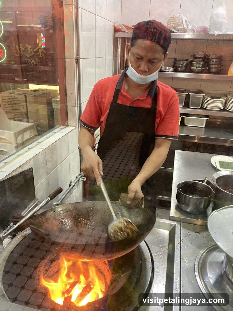 Chef Cooking in Kitchen
