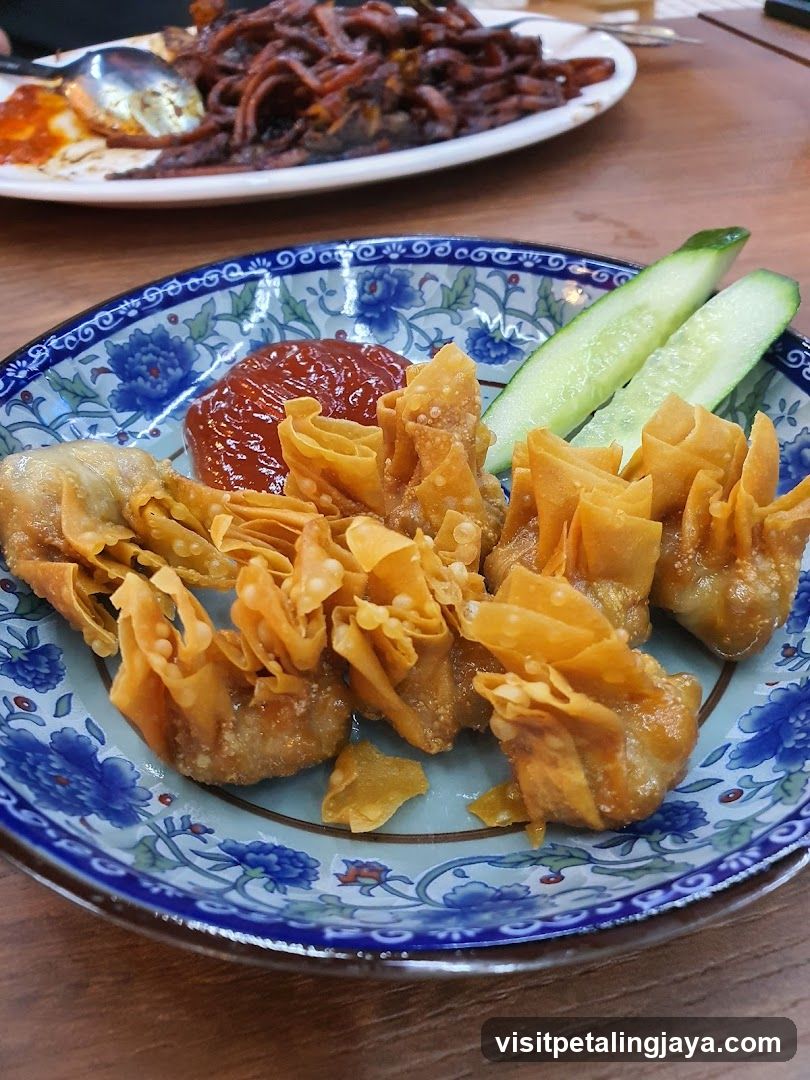 Fried Dumplings with Sauce and Cucumber