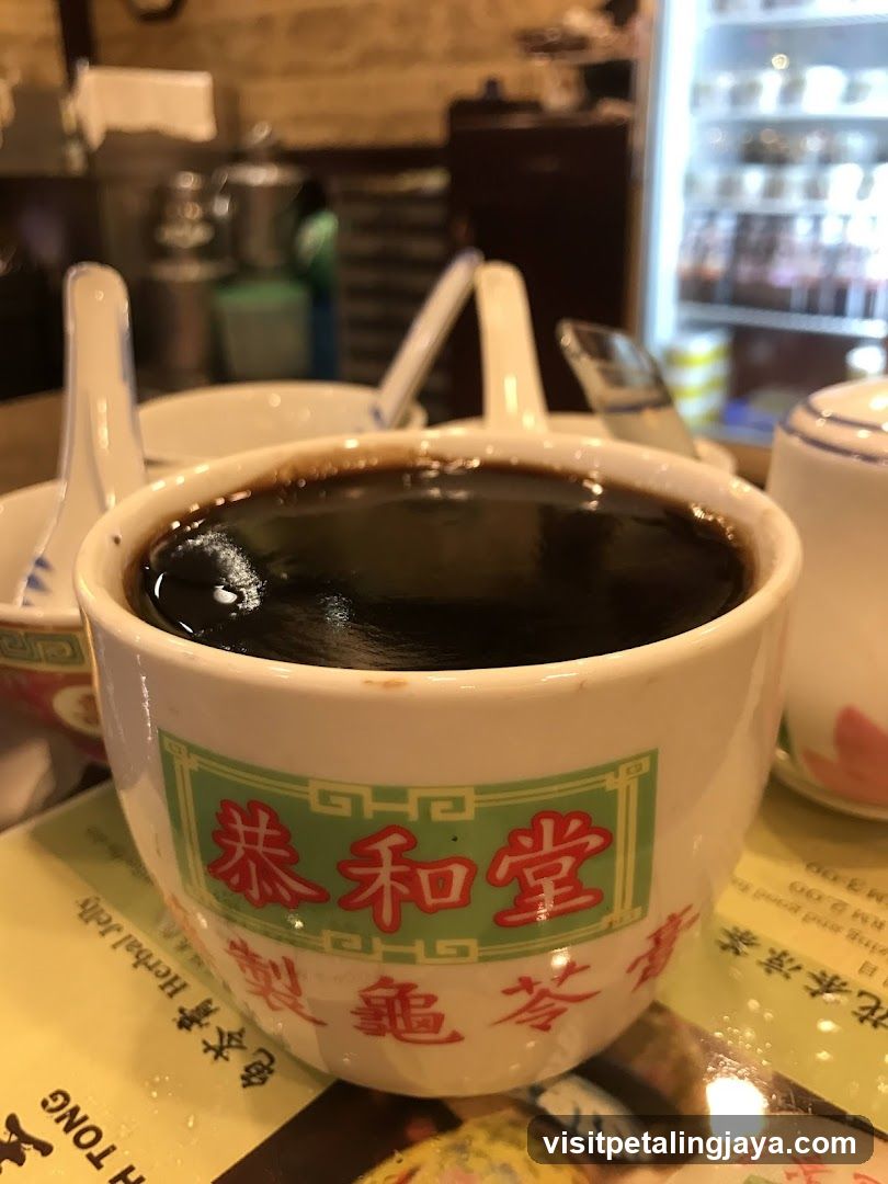 Cup of dark beverage at a restaurant