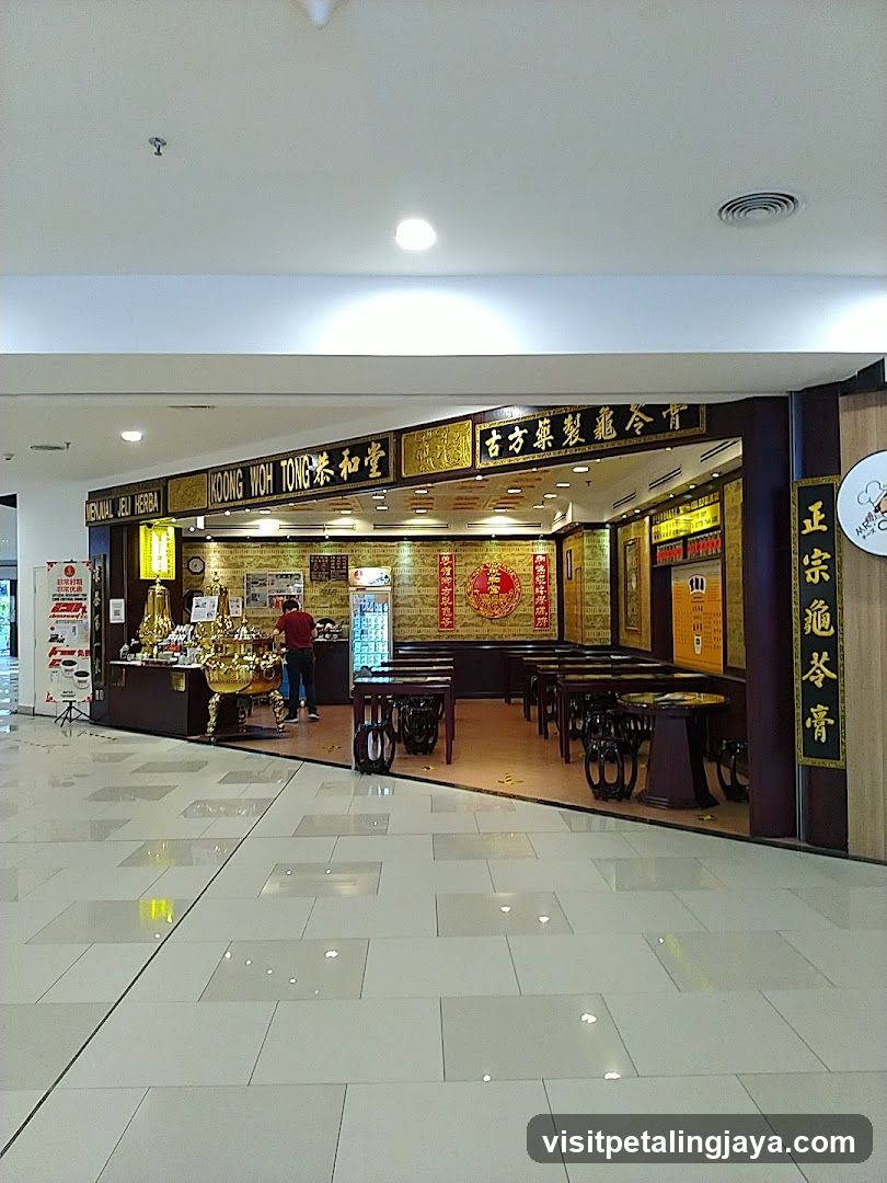 Interior of a shop with tables and staff