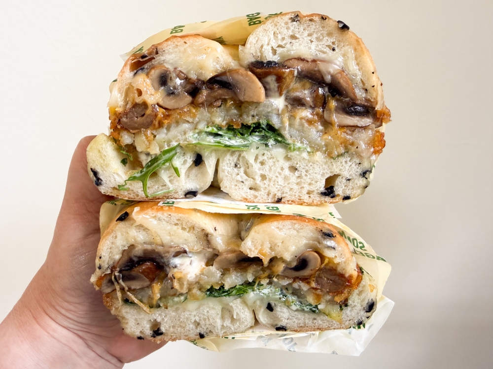 Happy Mushroom bagel sandwich with mushrooms, mozzarella and rocket at Sonny Bagel Shop PJ